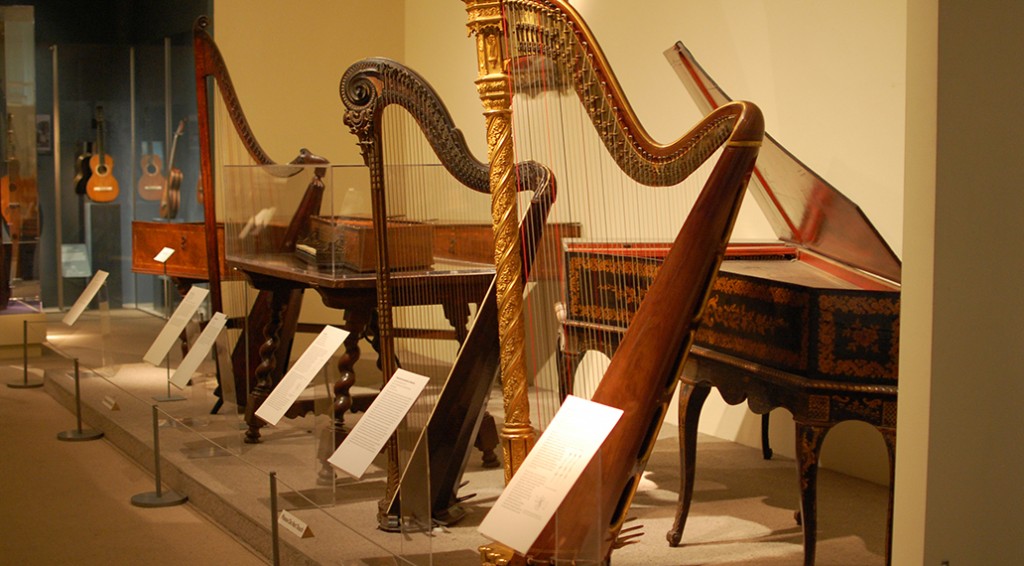 Admiring the antique harps at the MET in New York City.